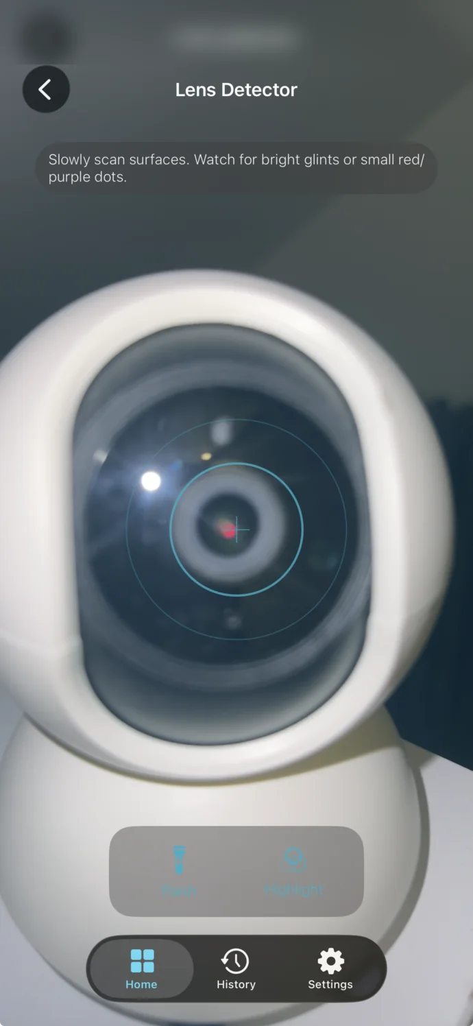 Lens Detector highlighting the reflection from a camera lens.